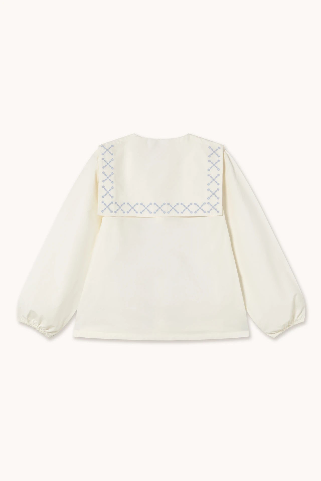the tiny big sister cross flower embroidered blouse